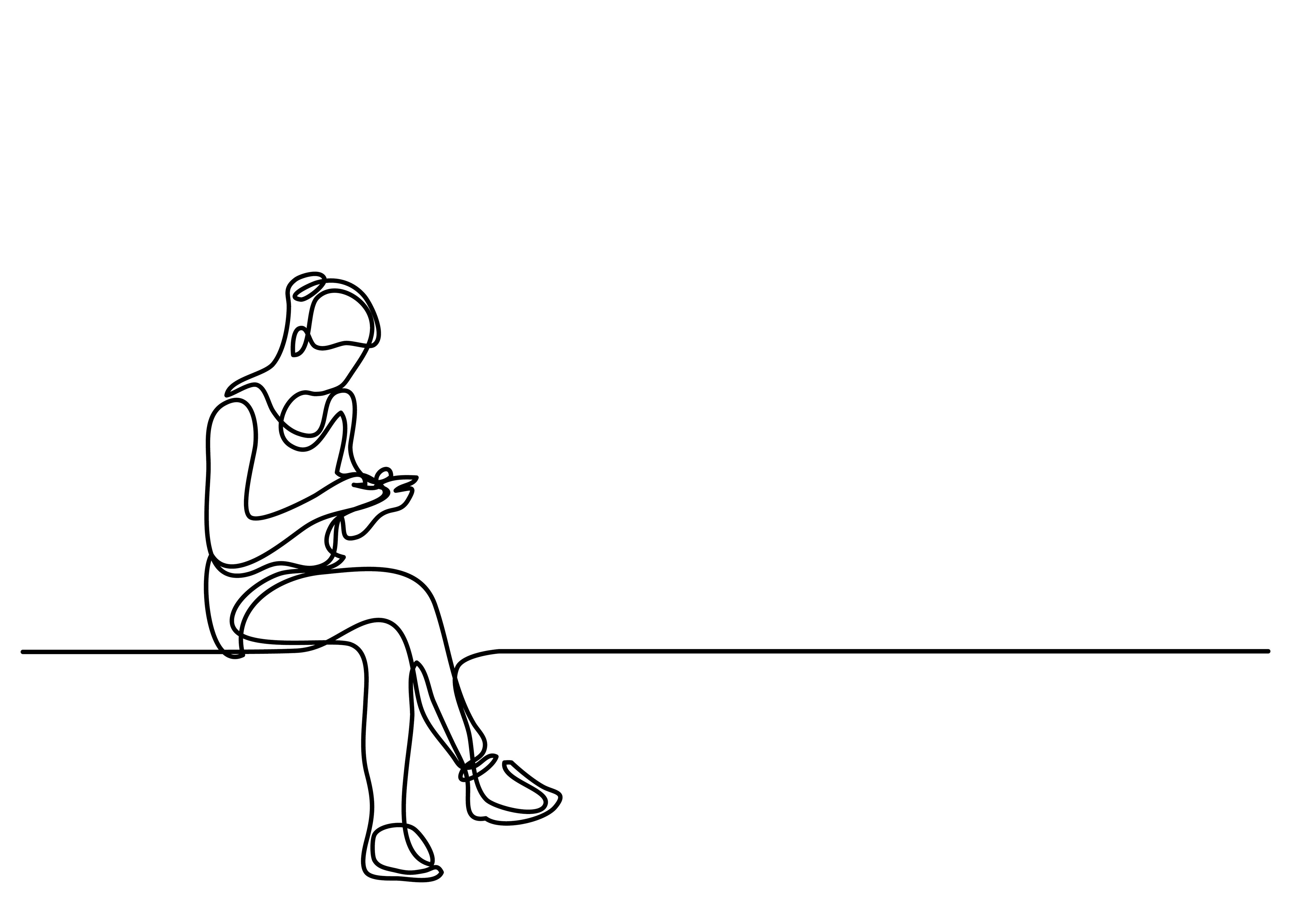 Woman sitting and texting